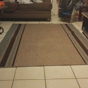 Large indoor outdoor area rug Brown.